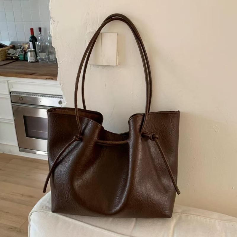 Fashion string with tie knot design large capacity shoulder bag autumn and winter commuting retro temperament tote big bag темно-коричневого кольору
Fashion string with tie knot design large capacity shoulder bag autumn and winter commuting retro temperament tote big bag темно-коричневого кольору