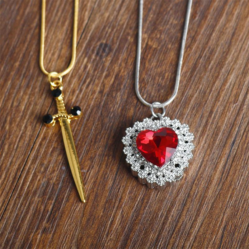 2Pcs Gothic Punk One Sword Through The Heart Set Pendant Necklace Creative Red Heart Chain Choker Couple Gift
2Pcs Gothic Punk One Sword Through The Heart Set Pendant Necklace Creative Red Heart Chain Choker Couple Gift