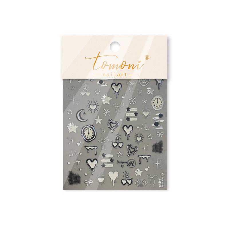 Tomoni Metal Nail Stickers: DIY Dark Style with Star, Moon, and Heartbeat Designs.
Tomoni Metal Nail Stickers: DIY Dark Style with Star, Moon, and Heartbeat Designs.