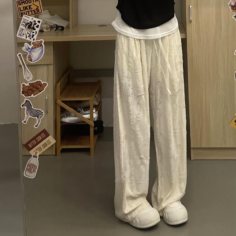 Повседневные брюки Off - White с рваными деталями и отделкой стразами для женщин - Весенне-осенние драпирующиеся стройнящие повседневные брюки в пол с широкими штанинами S
Повседневные брюки Off - White с рваными деталями и отделкой стразами для женщин - Весенне-осенние драпирующиеся стройнящие повседневные брюки в пол с широкими штанинами S