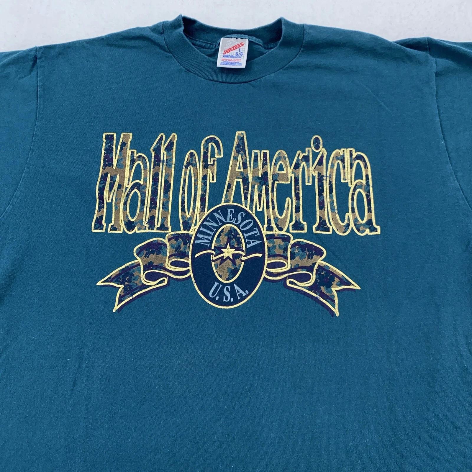 Vintage Mall of America Shirt Mens M/L Minnesota USA Graphic Jerzees 90s Tee 3XL
Vintage Mall of America Shirt Mens M/L Minnesota USA Graphic Jerzees 90s Tee 3XL