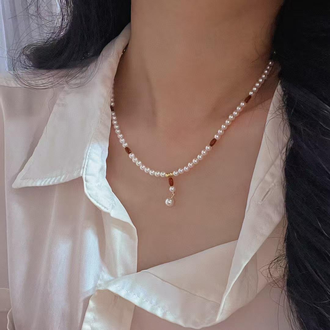 Vintage Design Sense Faux High Quality Pearl Natural Amber Clavicle Chain Necklace
Vintage Design Sense Faux High Quality Pearl Natural Amber Clavicle Chain Necklace