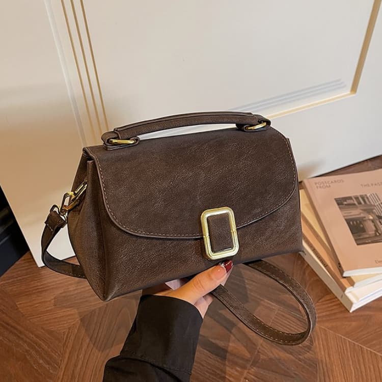 Frosted square buckle handbag women s shoulder underarm bag кавовий
Frosted square buckle handbag women s shoulder underarm bag кавовий