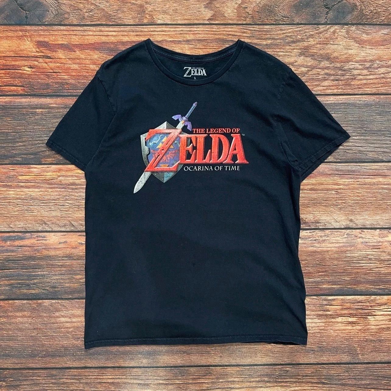 Zelda Ocarina of Time T-Shirt L Cotton Vintage Hylian Shield Master Sword Tee M
Zelda Ocarina of Time T-Shirt L Cotton Vintage Hylian Shield Master Sword Tee M