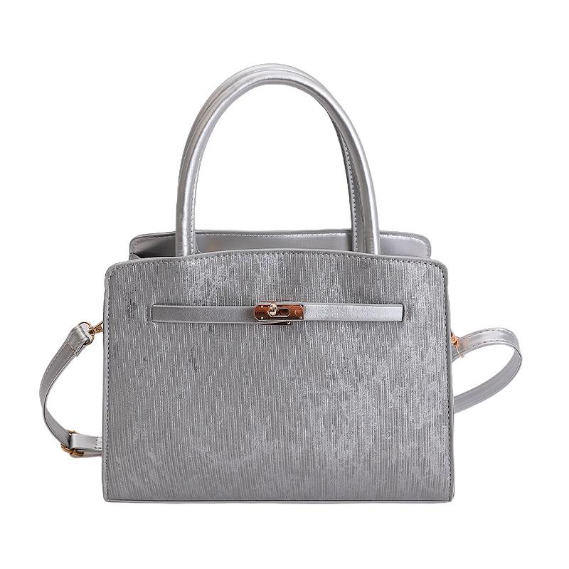 Retro spring casual largecapacity small square bag new texture crossbody handbag woman срібний
Retro spring casual largecapacity small square bag new texture crossbody handbag woman срібний