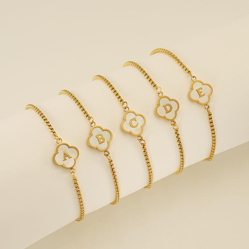 Elegant Stainless Steel Four-Leaf Clover Letter Bracelet - High-End Versatile Design 18K
Elegant Stainless Steel Four-Leaf Clover Letter Bracelet - High-End Versatile Design 18K