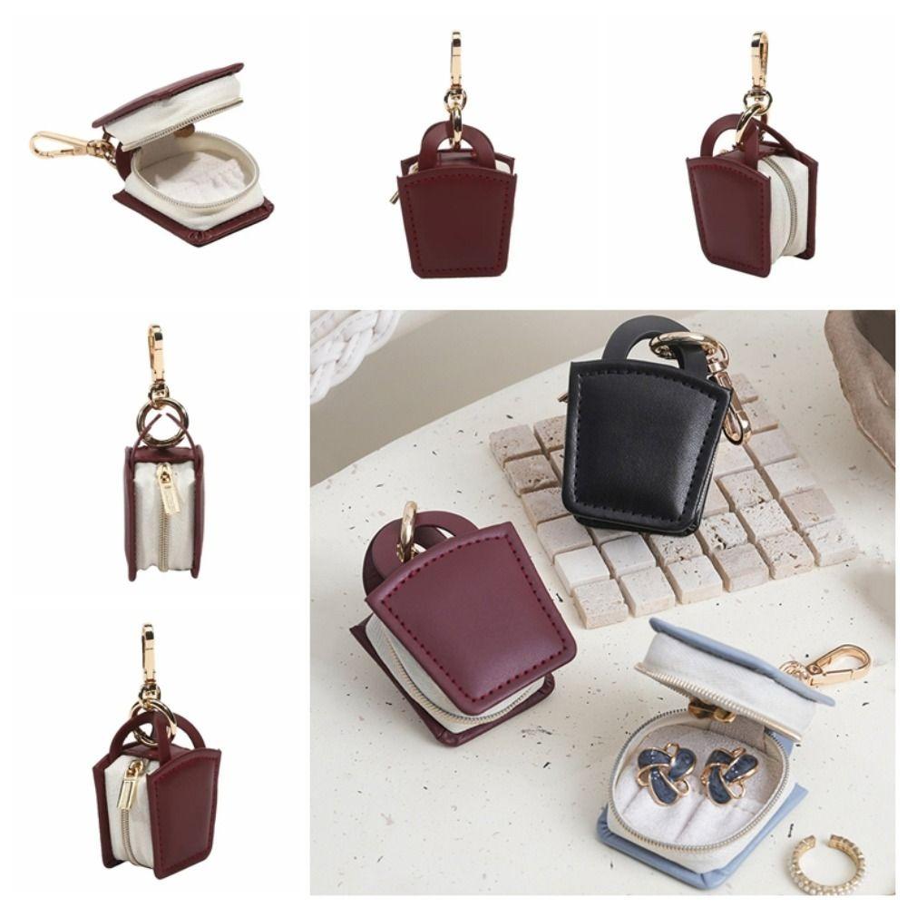 Necklace Bracelet Jewelry Bag Keychain Mini Jewelry Storage Case Bag Hanging вина червоного кольору
Necklace Bracelet Jewelry Bag Keychain Mini Jewelry Storage Case Bag Hanging вина червоного кольору