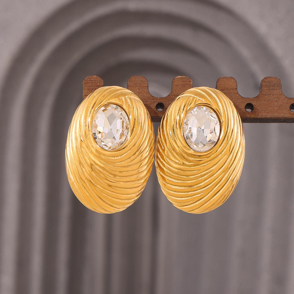 European and American Fashion Oval White Glass Stone Bird s Nest Earrings, 18K Gold Plated Titanium Steel
European and American Fashion Oval White Glass Stone Bird s Nest Earrings, 18K Gold Plated Titanium Steel