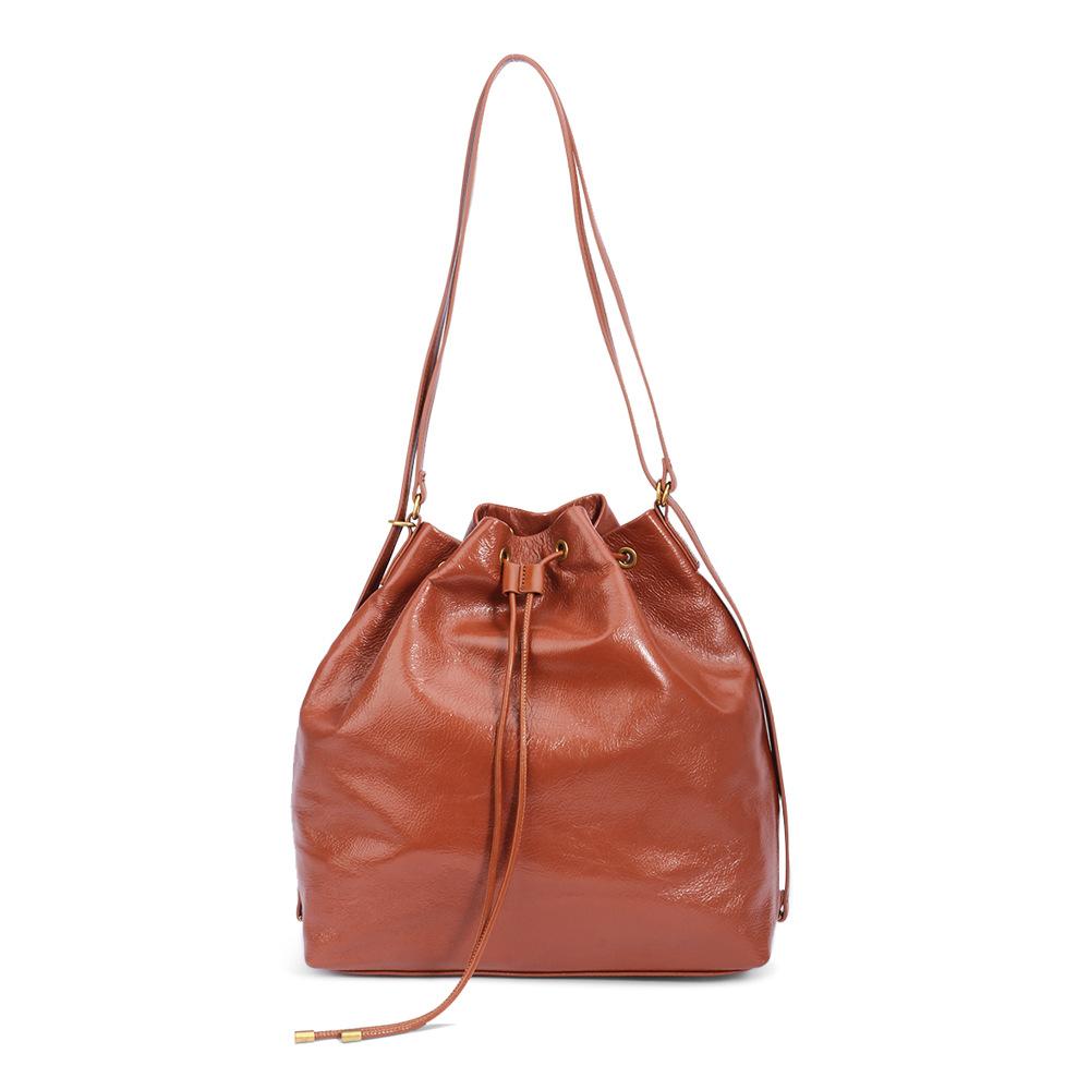 Первый слой вощеной коровьей кожи, женская сумка-ведро, высококачественная сумка Sense Niche Simple, большая вместимость, подмышечная сумка
Первый слой вощеной коровьей кожи, женская сумка-ведро, высококачественная сумка Sense Niche Simple, большая вместимость, подмышечная сумка