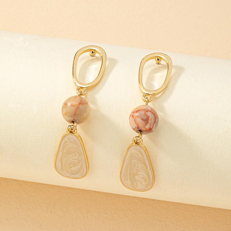Korean Minimalist Women’s Retro Pearl Stud Earrings - Niche Design Beaded Textured Style
Korean Minimalist Women’s Retro Pearl Stud Earrings - Niche Design Beaded Textured Style