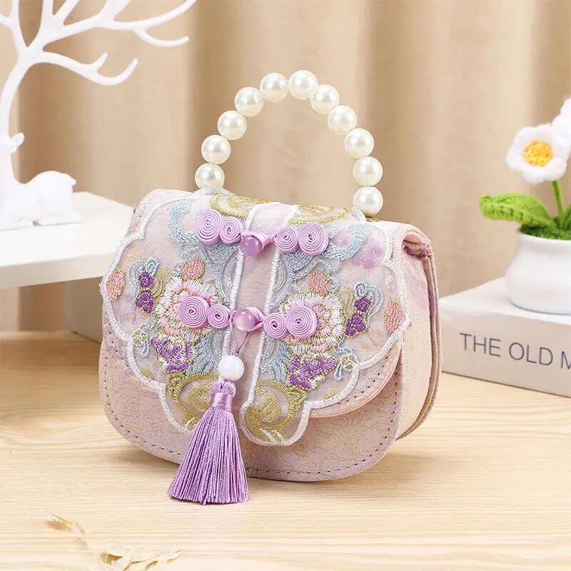 Children s Bag Ancient Style Embroidery Coin Purse High-Grade Exquisite Little Princess Handbag Pearl Hand-Held Storage Wallet
Children s Bag Ancient Style Embroidery Coin Purse High-Grade Exquisite Little Princess Handbag Pearl Hand-Held Storage Wallet
