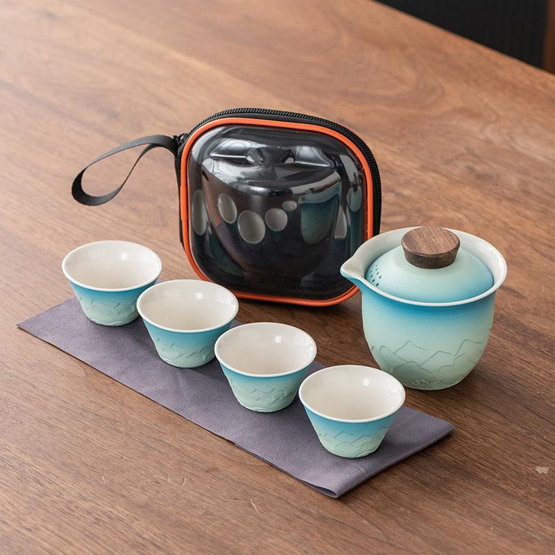Japanese-style outdoor travel portable travel tea set, one pot of four cups, high-end express cup tea set
Japanese-style outdoor travel portable travel tea set, one pot of four cups, high-end express cup tea set
