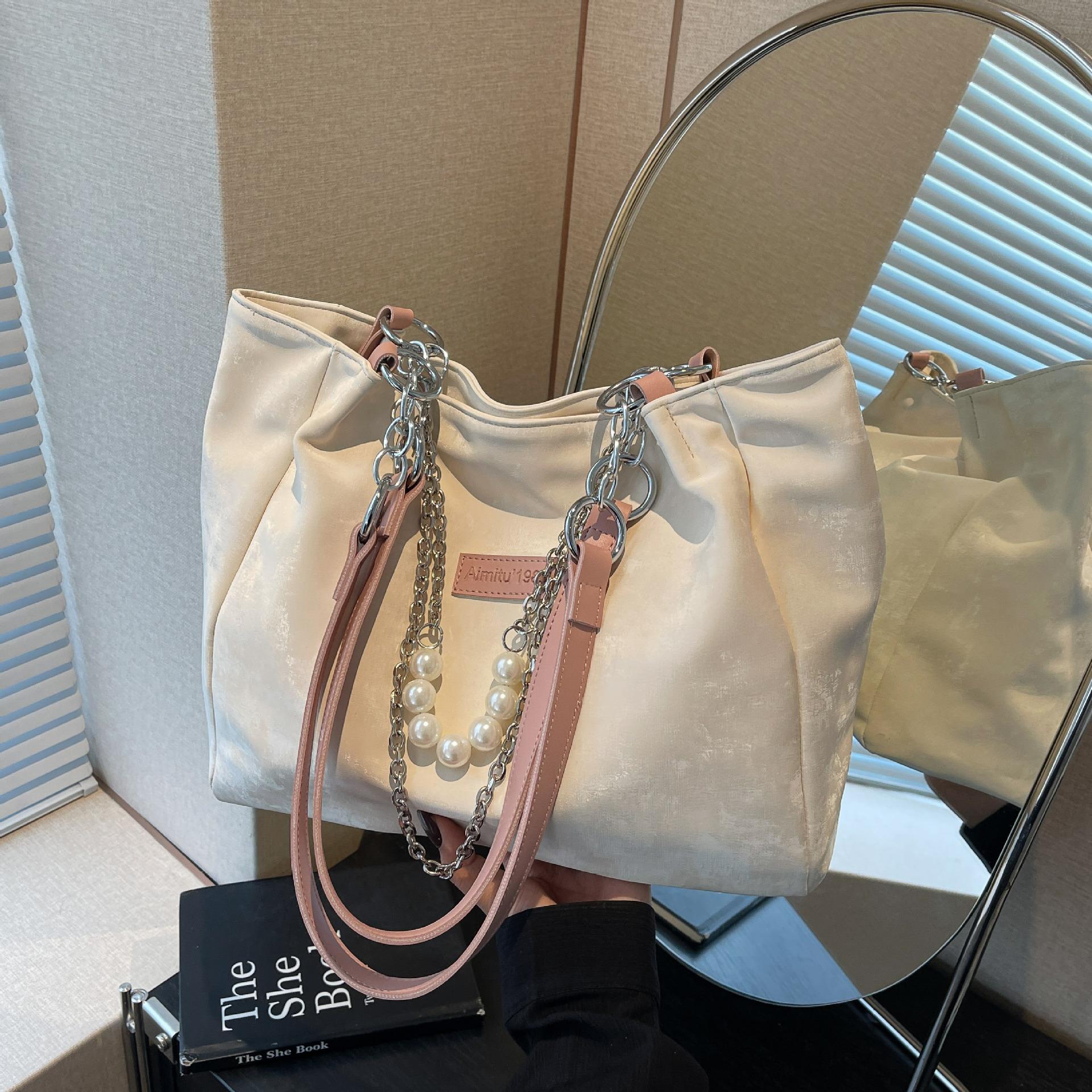 Women s bag new large-capacity commuting fashion versatile niche shoulder tote bag
Women s bag new large-capacity commuting fashion versatile niche shoulder tote bag