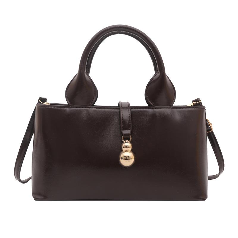 Glossy fashion sense portable bucket bag simple trend shoulder bag daily personality messenger bag темно-коричневого кольору
Glossy fashion sense portable bucket bag simple trend shoulder bag daily personality messenger bag темно-коричневого кольору