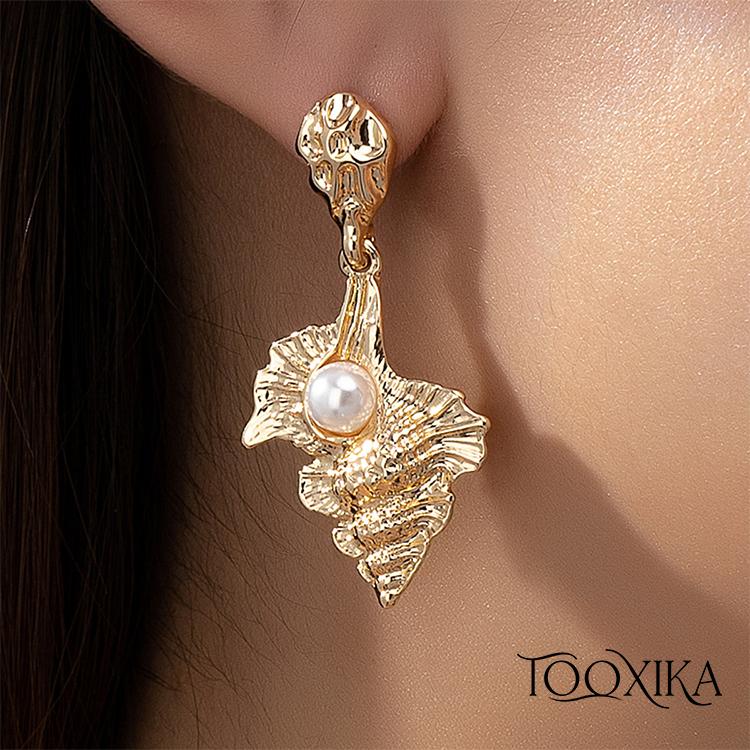 Маленький и модный жемчуг из ракушки серии Ocean в сочетании с персонализированными и минималистичными нишевыми серьгами
Маленький и модный жемчуг из ракушки серии Ocean в сочетании с персонализированными и минималистичными нишевыми серьгами