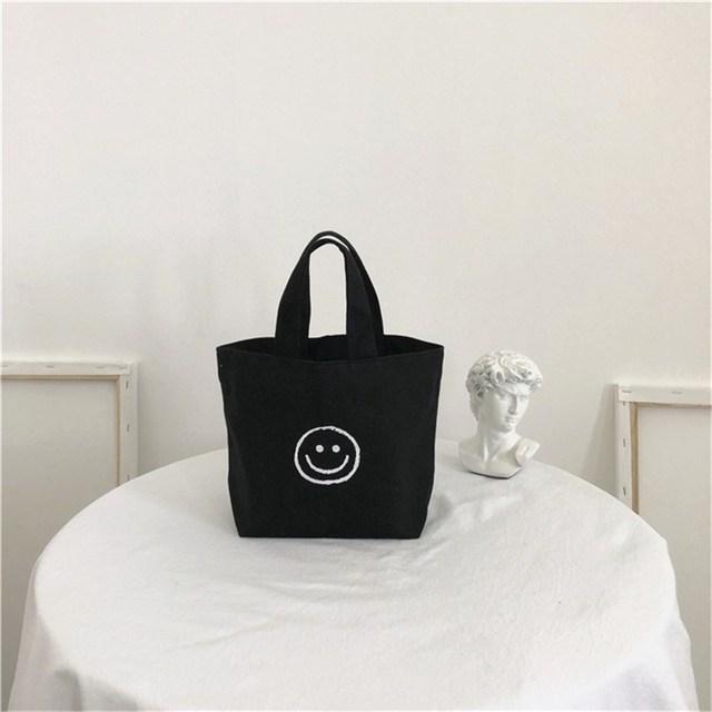 1 Pc Cute Smile Face Mini Women Shopping Bag Fashion Mobile Phone Bag Lady Purse Small Casual Handbag Bolso Grande Mujer
1 Pc Cute Smile Face Mini Women Shopping Bag Fashion Mobile Phone Bag Lady Purse Small Casual Handbag Bolso Grande Mujer