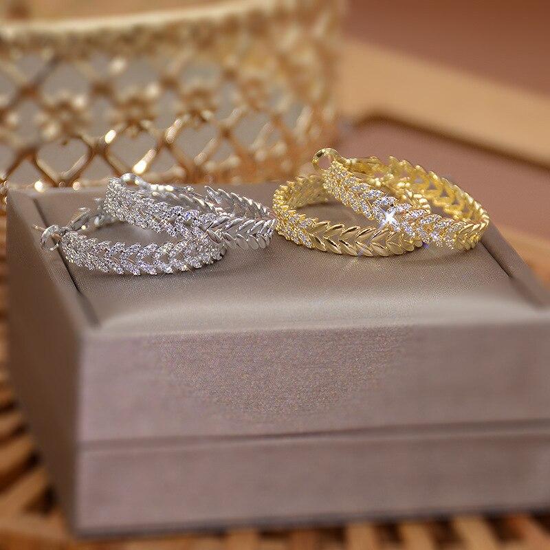 Трендовые микро-инкрустированные окисленные сверкающие циркониевые серьги-кольца с пшеницей для женщин, модные украшения для вечеринки и фестиваля
Трендовые микро-инкрустированные окисленные сверкающие циркониевые серьги-кольца с пшеницей для женщин, модные украшения для вечеринки и фестиваля