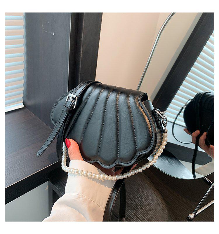 Women s Bag Fashion Light Luxury PU Leather Shoulder Messenger Bag Small Pearl Portable Shell Bag чёрный
Women s Bag Fashion Light Luxury PU Leather Shoulder Messenger Bag Small Pearl Portable Shell Bag чёрный