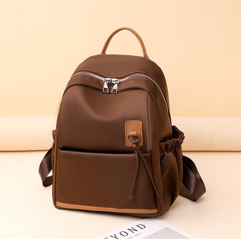 Daily commute portable literary backpack new fashion simple shoulder backpack темно-коричневого кольору
Daily commute portable literary backpack new fashion simple shoulder backpack темно-коричневого кольору