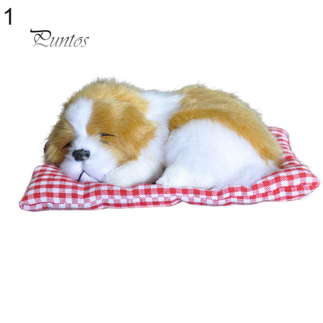 Спящий на подушке щенок жёлтый
Спящий на подушке щенок жёлтый