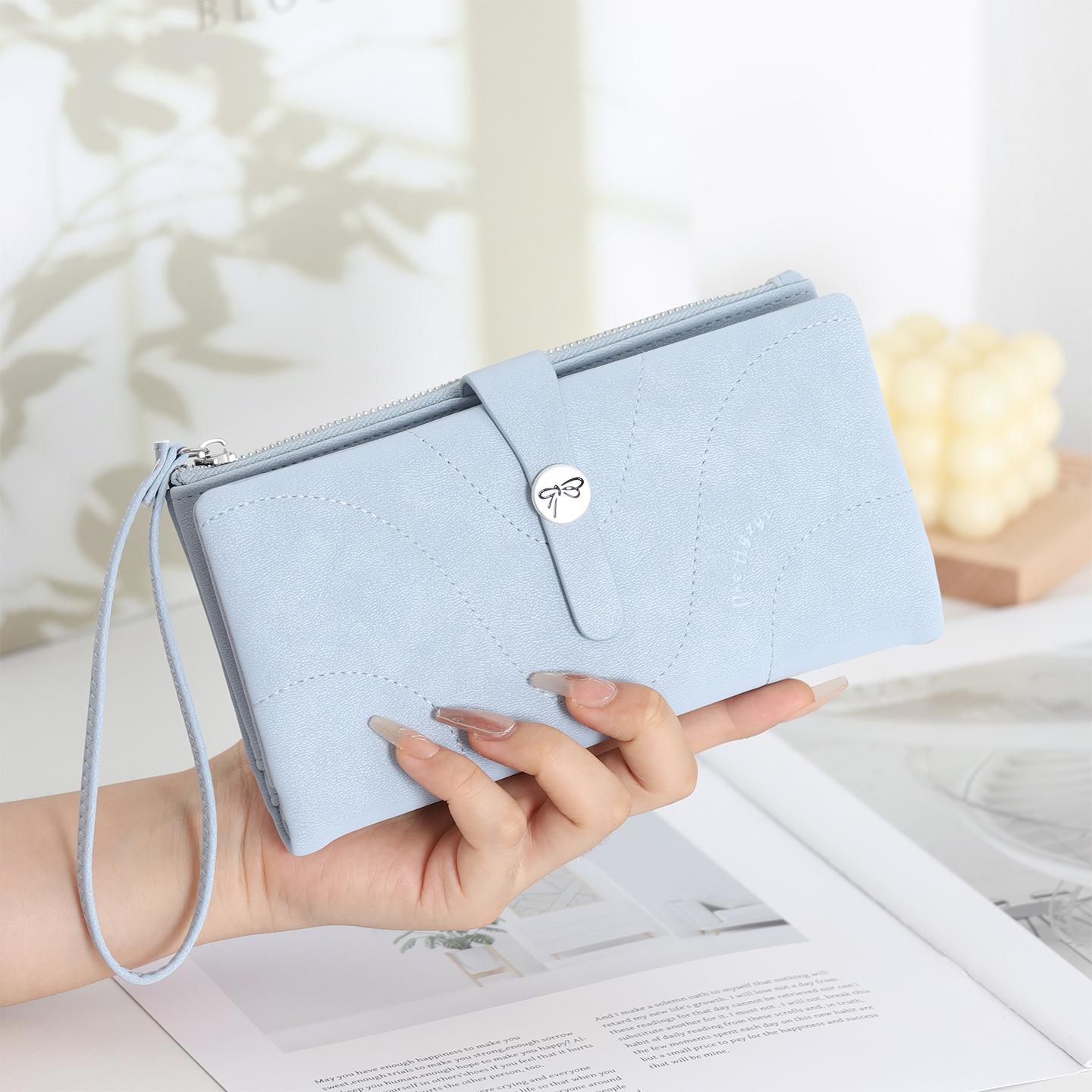 New women s long wallet, two fold, simple buckle solid color multi card handheld phone bag, zipper portable светло-синий
New women s long wallet, two fold, simple buckle solid color multi card handheld phone bag, zipper portable светло-синий