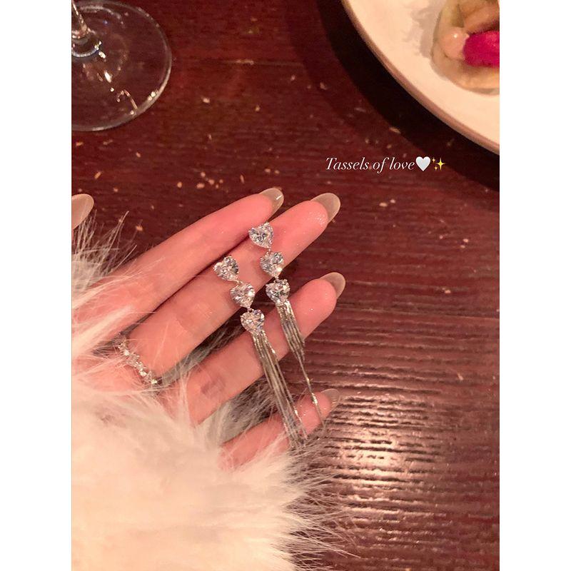 Accessible Luxury Tassel Earrings Best Selling Unique Female Niche Style Zircon Pair of 925 tremella needles
Accessible Luxury Tassel Earrings Best Selling Unique Female Niche Style Zircon Pair of 925 tremella needles