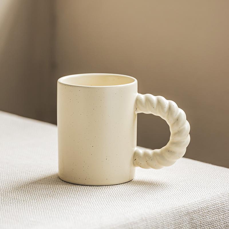 Twist handle cup Simple ink splashing cup Household cream ceramic cup Breakfast cup Straight cup Coffee cup 350ml
Twist handle cup Simple ink splashing cup Household cream ceramic cup Breakfast cup Straight cup Coffee cup 350ml