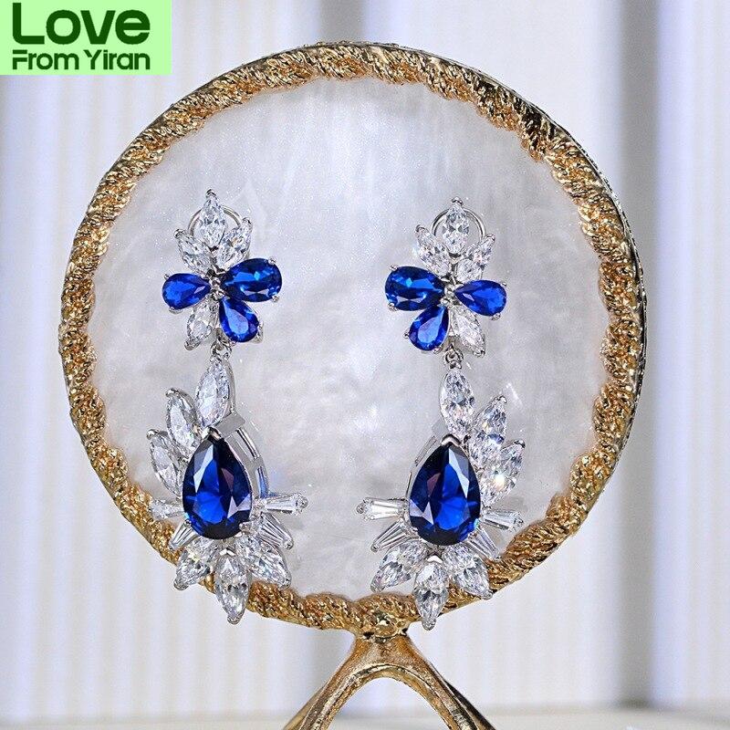 Роскошные серьги-подвески из стерлингового серебра 925 пробы для женщин, сверкающие синие бриллианты, женские серьги, изящные ювелирные изделия, красные серьги, подарок на вечеринку 
Роскошные серьги-подвески из стерлингового серебра 925 пробы для женщин, сверкающие синие бриллианты, женские серьги, изящные ювелирные изделия, красные серьги, подарок на вечеринку