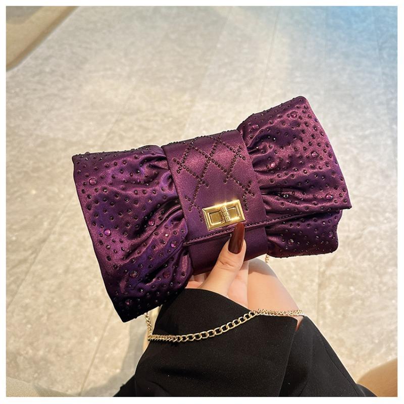 Gilt bright bow dinner bag full of diamonds light luxury banquet clutch bag niche high-end chain dress bag фіолетовий
Gilt bright bow dinner bag full of diamonds light luxury banquet clutch bag niche high-end chain dress bag фіолетовий