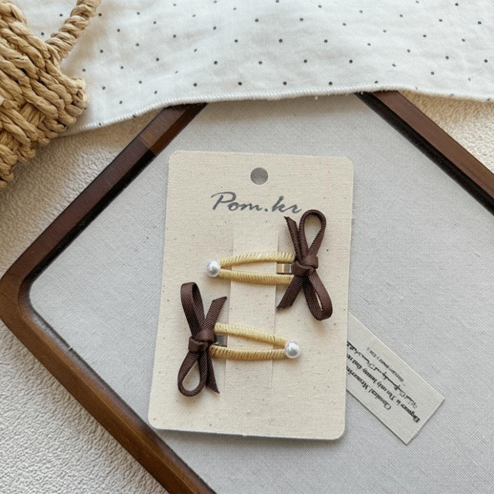 2pcs/set Korean Cottagecore Bow Hair Clips Pearl with Bow Design BB Snap Clips Headwear Side Part Bangs Hairpins for Girls
2pcs/set Korean Cottagecore Bow Hair Clips Pearl with Bow Design BB Snap Clips Headwear Side Part Bangs Hairpins for Girls