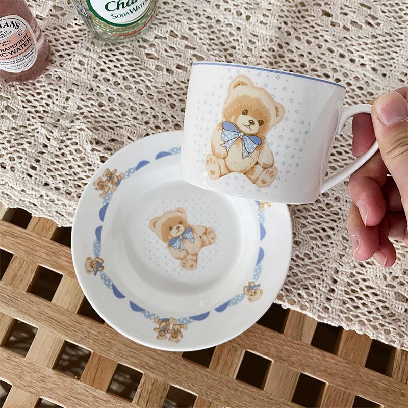 Милый маленький медведь корейский костяной фарфор чашка для кофе и блюдце набор столовых приборов кофейная тарелка блюдо домашний послеобеденный чайный сервиз подарок для девочки 250ml
Милый маленький медведь корейский костяной фарфор чашка для кофе и блюдце набор столовых приборов кофейная тарелка блюдо домашний послеобеденный чайный сервиз подарок для девочки 250ml