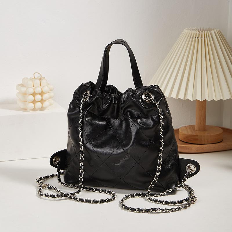 New women s bag niche design rhombus chain backpack portable bucket bag premium solid color backpack
New women s bag niche design rhombus chain backpack portable bucket bag premium solid color backpack