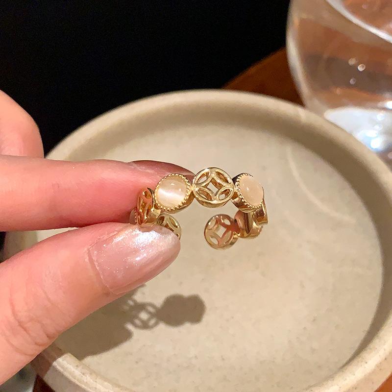 Round copper coin hollow resin open ring, court style index finger ring, niche design ring, female
Round copper coin hollow resin open ring, court style index finger ring, niche design ring, female