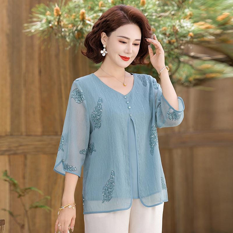 Sophisticated Lace T-shirt with Seven-Sleeve Two-Piece Look - Chic Summer Fashion for Moms XL (suggested 40-55 kg) синій
Sophisticated Lace T-shirt with Seven-Sleeve Two-Piece Look - Chic Summer Fashion for Moms XL (suggested 40-55 kg) синій