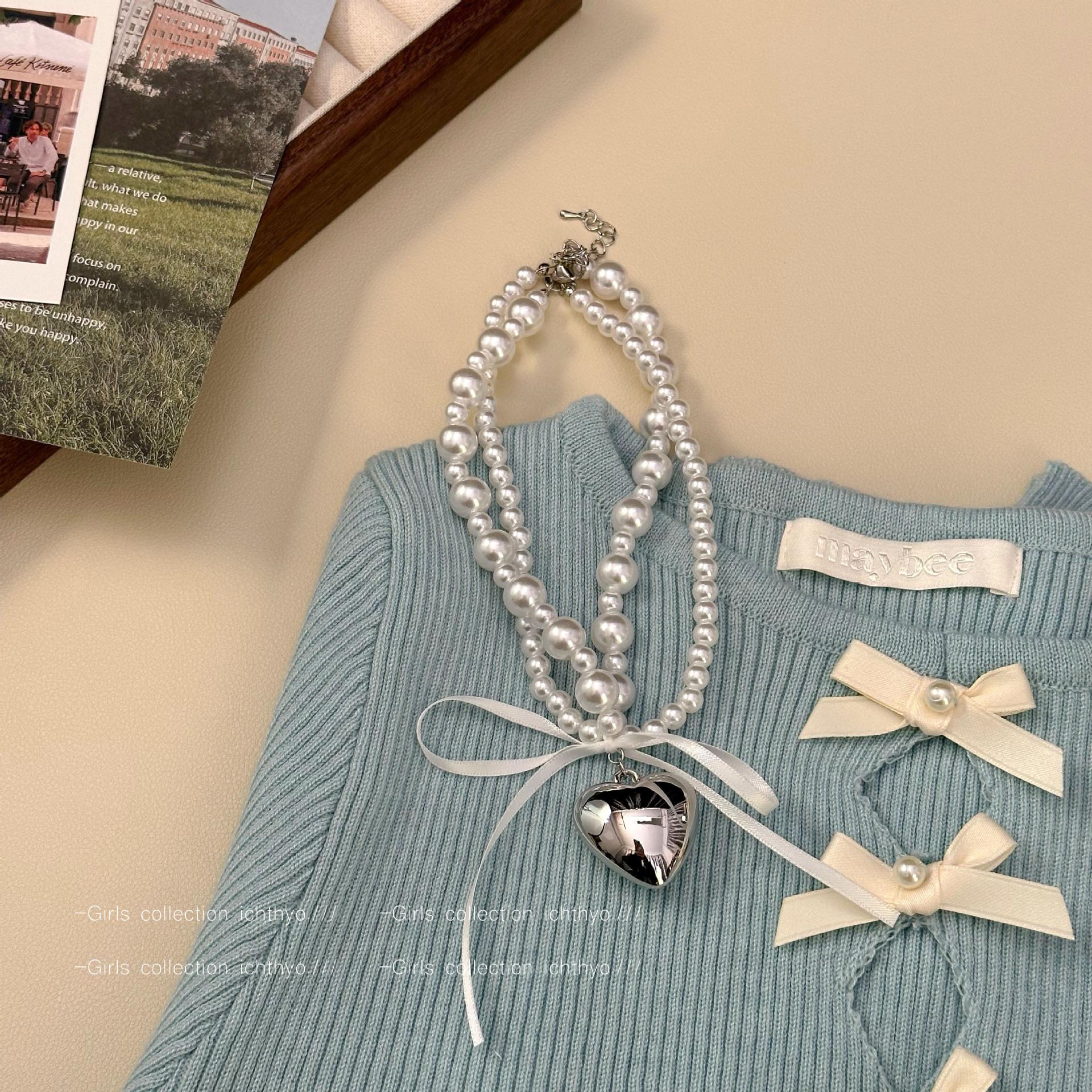 Bow ribbon love pearl necklace women s high-end collarbone chain light luxury niche sweater chain
Bow ribbon love pearl necklace women s high-end collarbone chain light luxury niche sweater chain