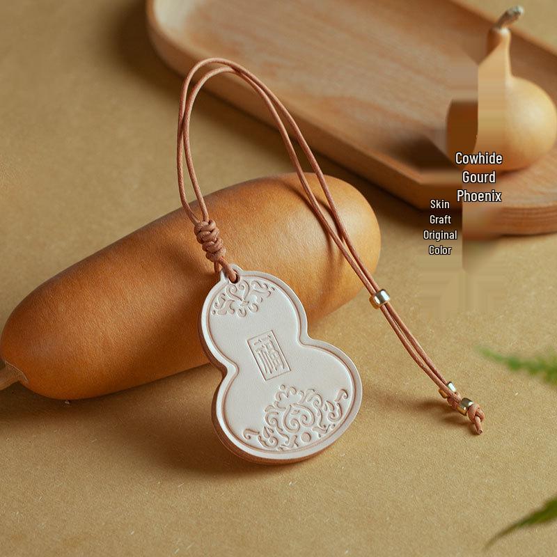 Ping An Gourd Cowhide Car Pendant: Unique and Elegant Auto Decoration Gift
Ping An Gourd Cowhide Car Pendant: Unique and Elegant Auto Decoration Gift