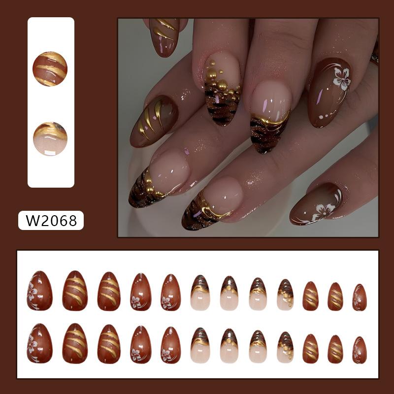 Three-dimensional chocolate zebra pattern cat s eye French ins wind wearing armor 24 pieces press on nails
Three-dimensional chocolate zebra pattern cat s eye French ins wind wearing armor 24 pieces press on nails