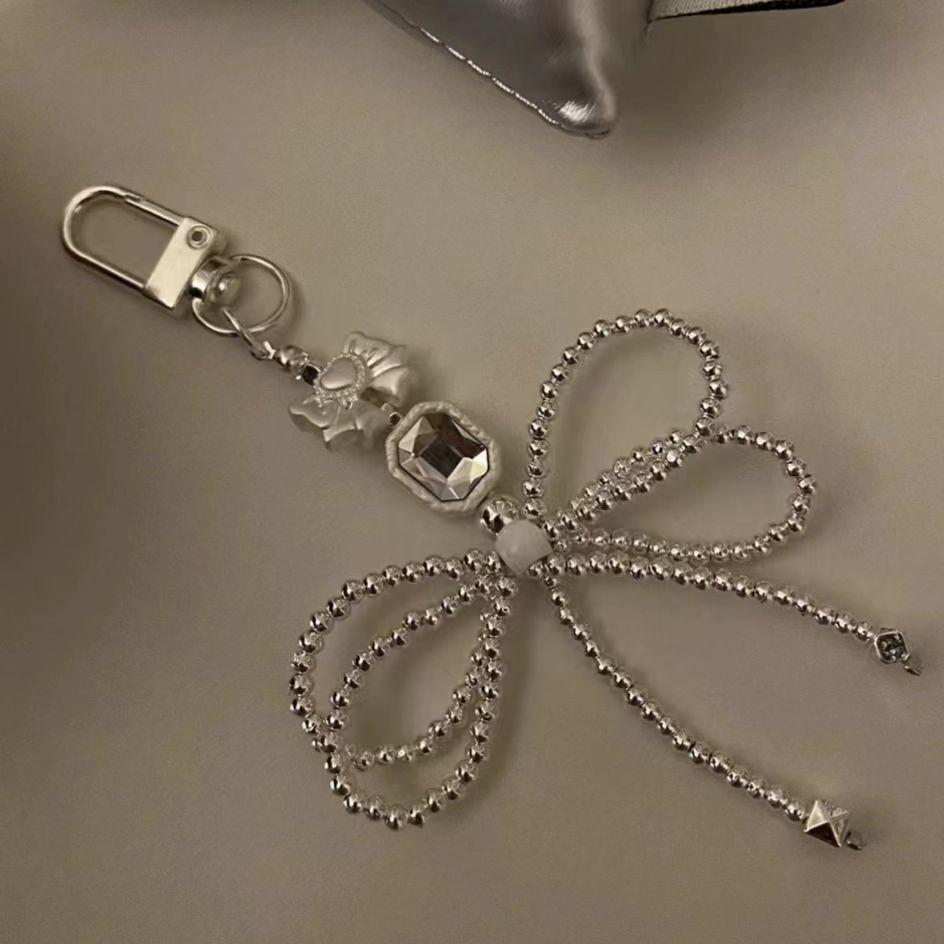 Korean INS Silver Bead Bowknot Phone Pendant Handmade Beaded Bag Charm Car Key Pendant Niche Design Silver Bead Bow Pendant
Korean INS Silver Bead Bowknot Phone Pendant Handmade Beaded Bag Charm Car Key Pendant Niche Design Silver Bead Bow Pendant