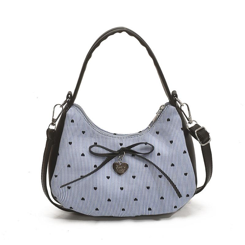 Pink bow crescent moon contrasting bag autumn new sweet and cool Spice Girl niche single shoulder diagonal cross armpit bag синій
Pink bow crescent moon contrasting bag autumn new sweet and cool Spice Girl niche single shoulder diagonal cross armpit bag синій