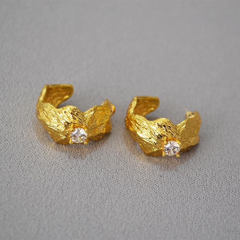 European & American Stylized Zircon-Studded Irregular Textured 925 Silver Earrings золотой
European & American Stylized Zircon-Studded Irregular Textured 925 Silver Earrings золотой
