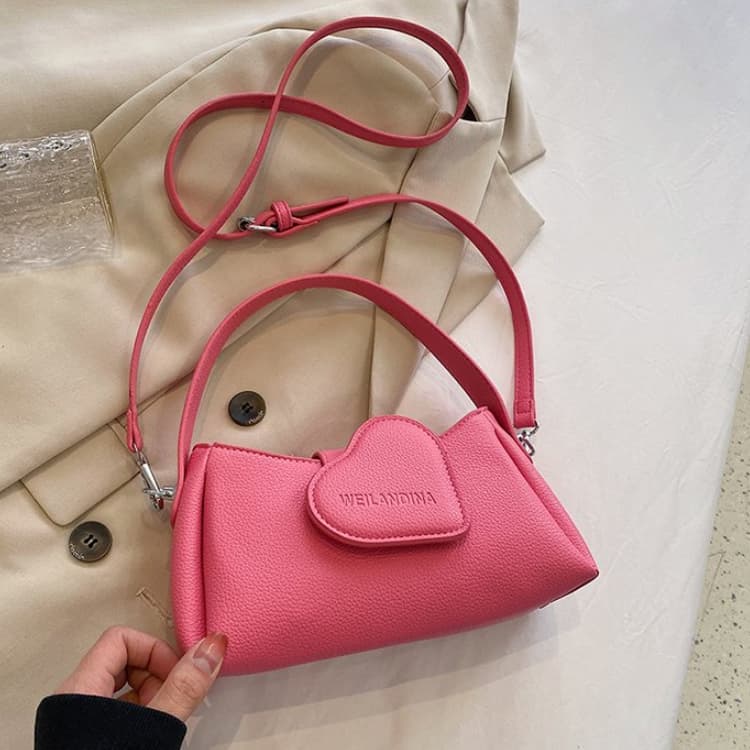 Lychee pattern love handbag women s shoulder underarm bag рожевий
Lychee pattern love handbag women s shoulder underarm bag рожевий