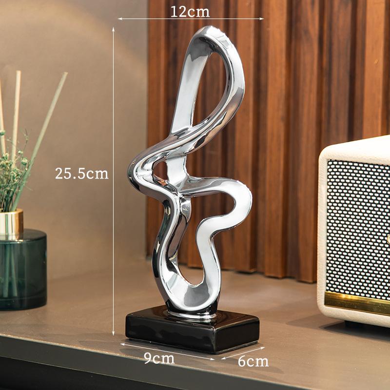 Creative Ceramic Handicrafts Golden Geometric Hollowed-out Ring Pleated Ribbon Decorative Figurines Home Decoration Accessories серебряный
Creative Ceramic Handicrafts Golden Geometric Hollowed-out Ring Pleated Ribbon Decorative Figurines Home Decoration Accessories серебряный