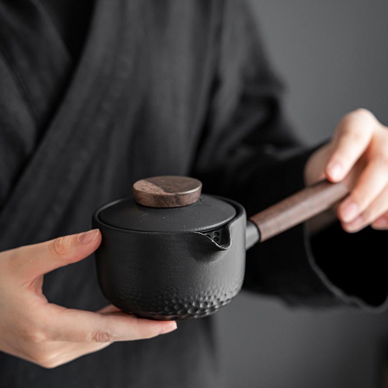 Side Handle Teapot Ebony Wood Handle Household Filter Teapot Ceramic Kung Fu Tea Set Tea Brewing Pot
Side Handle Teapot Ebony Wood Handle Household Filter Teapot Ceramic Kung Fu Tea Set Tea Brewing Pot