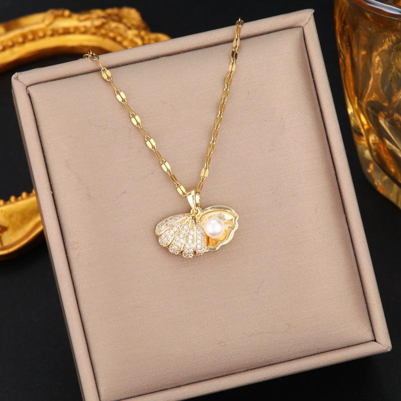 Французское ожерелье из жемчуга «Ракушка», Легкая роскошь, Индивидуальность, Высококлассное, Ретро, Модное, Универсальная подвеска из нержавеющей стали
Французское ожерелье из жемчуга «Ракушка», Легкая роскошь, Индивидуальность, Высококлассное, Ретро, Модное, Универсальная подвеска из нержавеющей стали