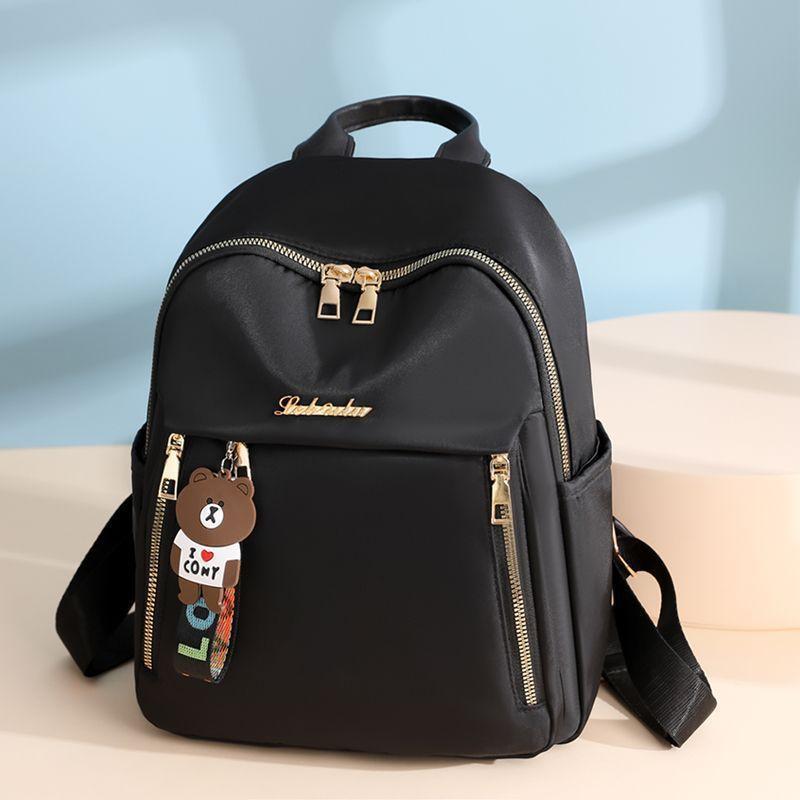 Cloth Oxford Letter Backpack With Water Resistant Design For City Commuting Style1
Cloth Oxford Letter Backpack With Water Resistant Design For City Commuting Style1