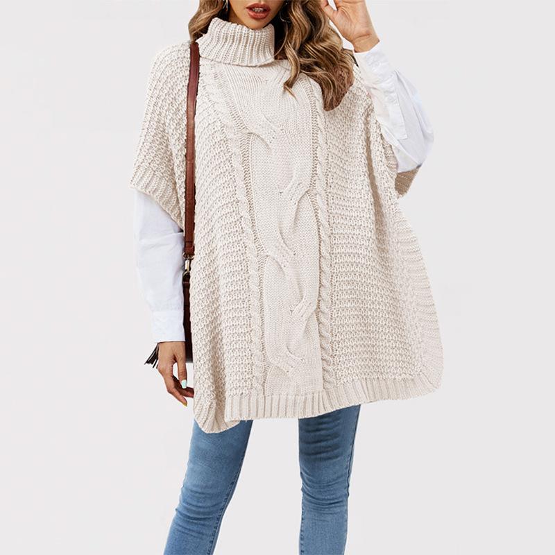 Женский бежевый вязаный свитер-кейп с высоким воротом и текстурой «косы» XL абрикосовый
Женский бежевый вязаный свитер-кейп с высоким воротом и текстурой «косы» XL абрикосовый