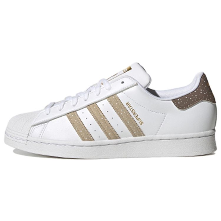 Кроссовки унисекс adidas Superstar Christmas Gingerbread White Footwear-White Raw-Gold FZ5462
Кроссовки унисекс adidas Superstar Christmas Gingerbread White Footwear-White Raw-Gold FZ5462