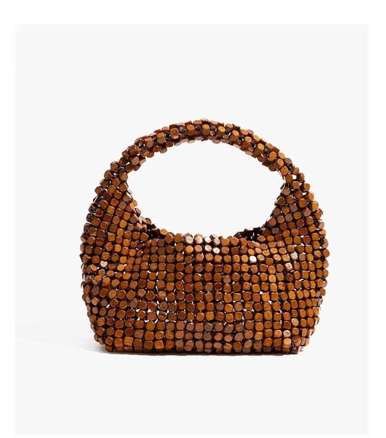 Vintage niche wooden beaded handbag 2026 new handwoven shoulder messenger bag summer beach bag
Vintage niche wooden beaded handbag 2026 new handwoven shoulder messenger bag summer beach bag