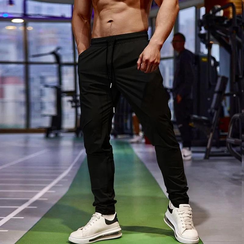 Sweatpants Men s Summer Ice Silk Thin Quick-Drying Sports Pants Casual Pants Tapered Leg Training Running Fitness Elastic Cropped Pants 4XL
Sweatpants Men s Summer Ice Silk Thin Quick-Drying Sports Pants Casual Pants Tapered Leg Training Running Fitness Elastic Cropped Pants 4XL