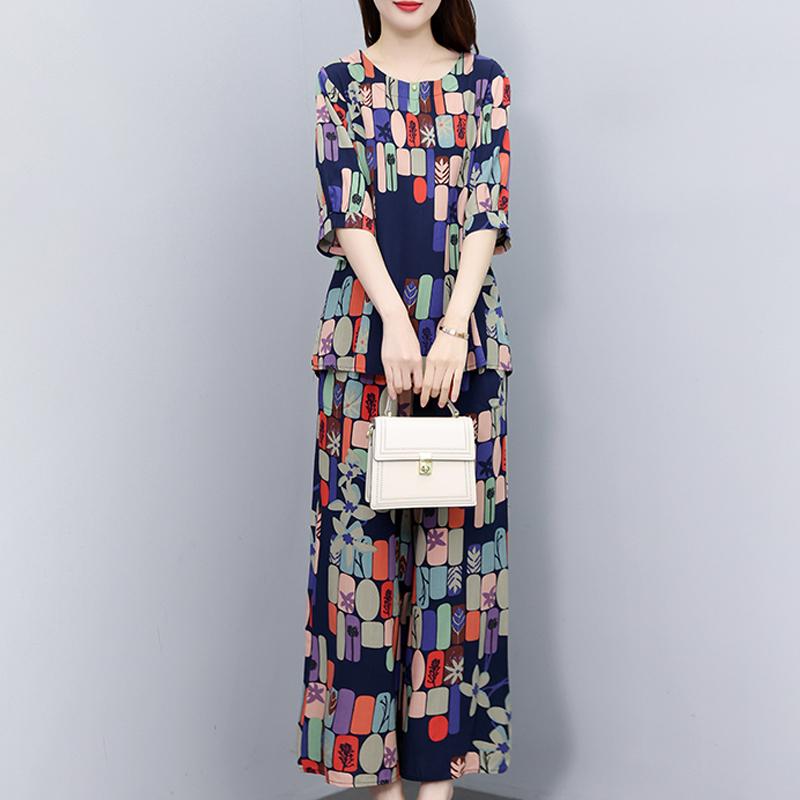 Женский комплект из 2 предметов с винтажным принтом, летняя одежда больших размеров, повседневные свободные элегантные комплекты с брюками, летняя одежда 7XL
Женский комплект из 2 предметов с винтажным принтом, летняя одежда больших размеров, повседневные свободные элегантные комплекты с брюками, летняя одежда 7XL